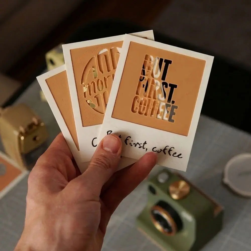 Hand holding PhotoBrew stencil cards