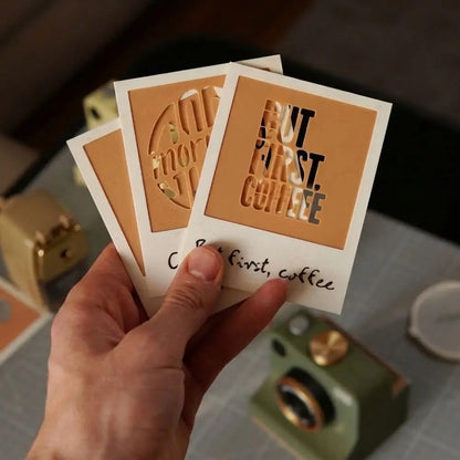 Hand holding PhotoBrew stencil cards