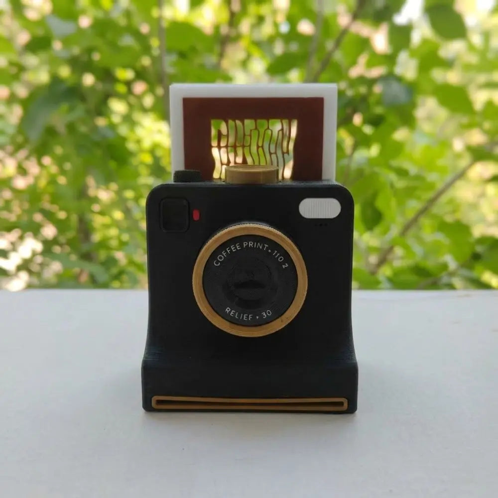 Front view of the black PhotoBrew latte art camera