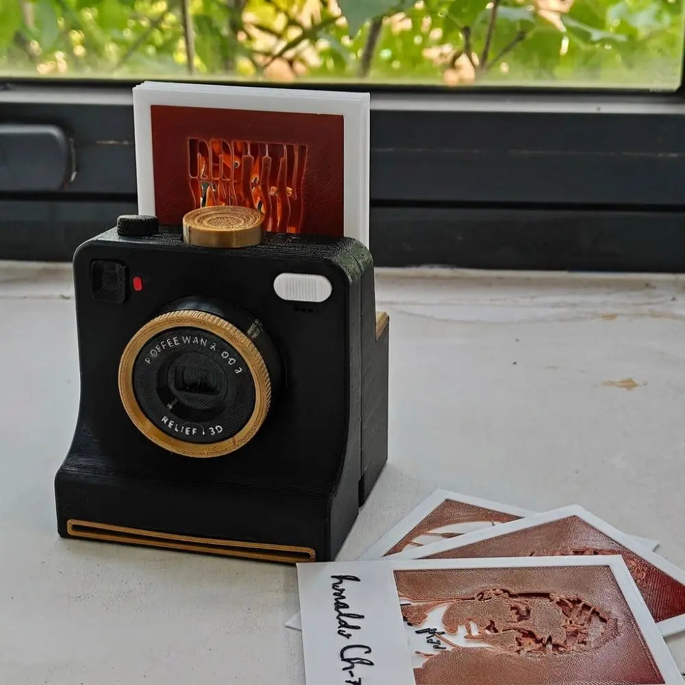 Black PhotoBrew on a windowsill with stencil cards